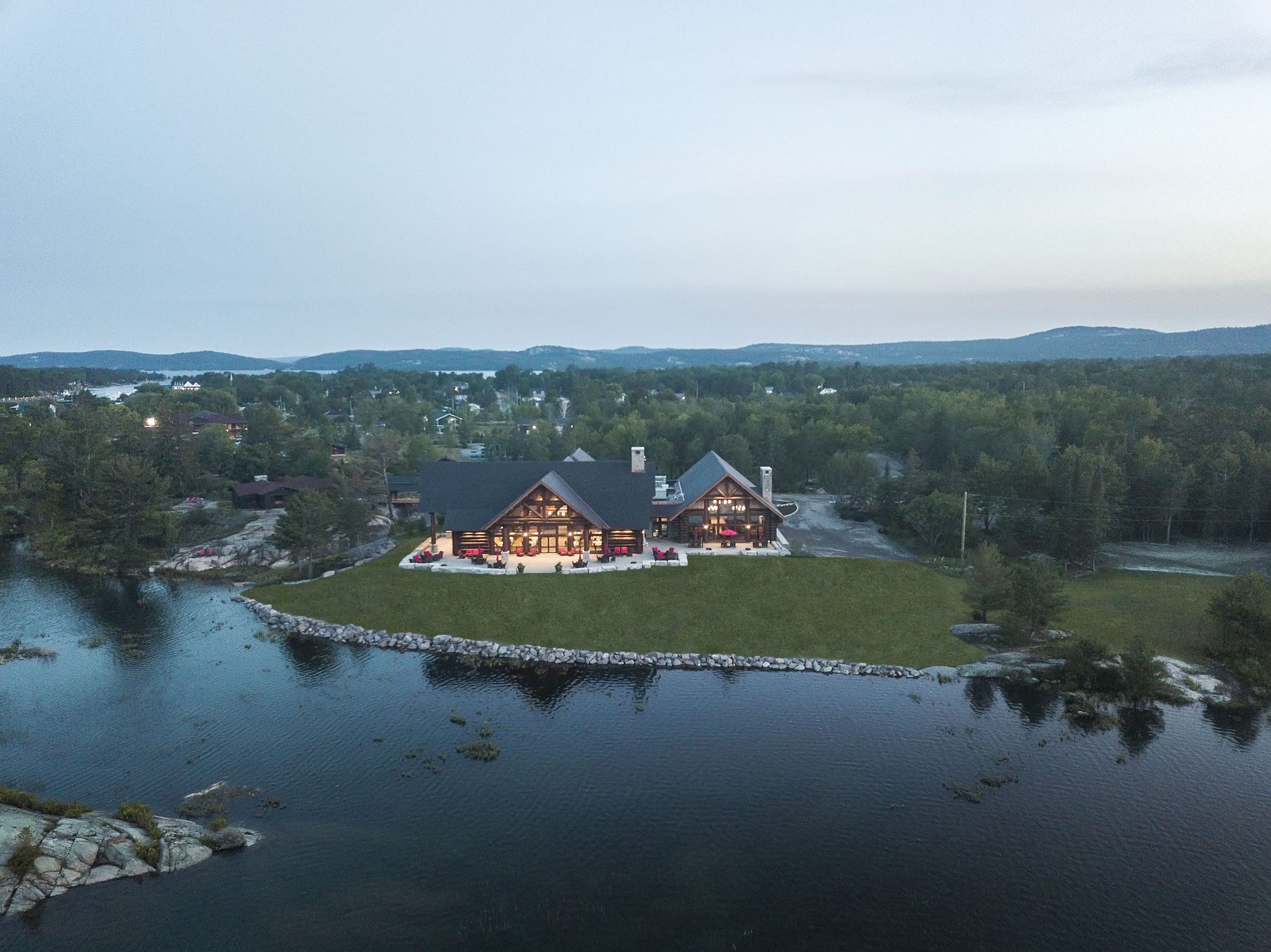 Canada House glowing at dusk above the Killarney Channel